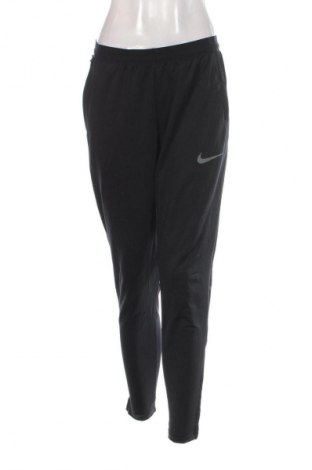 Dámske tepláky Nike, Veľkosť M, Farba Čierna, Cena  30,95 €