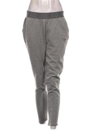 Γυναικείο αθλητικό παντελόνι Nike, Μέγεθος M, Χρώμα Γκρί, Τιμή 30,99 €