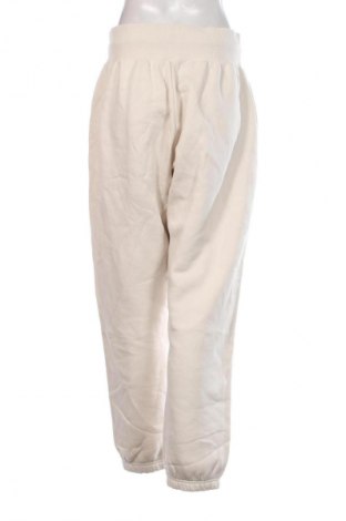 Damen Sporthose Nike, Größe L, Farbe Beige, Preis 39,99 €