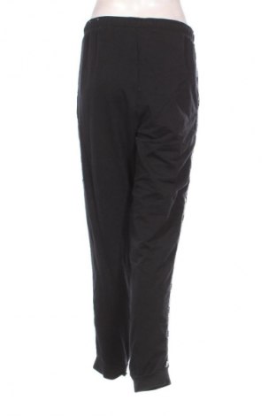 Damen Sporthose PUMA, Größe L, Farbe Schwarz, Preis 39,42 €