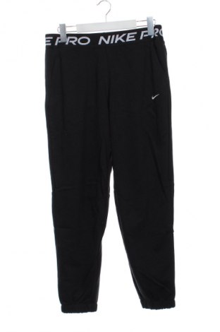 Dětské tepláky Nike, Velikost 13-14y/ 164-168 cm, Barva Černá, Cena  965,00 Kč