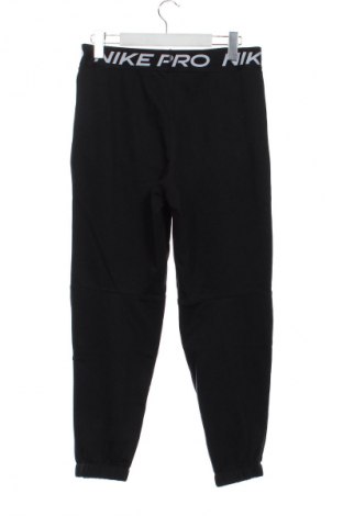 Dětské tepláky Nike, Velikost 13-14y/ 164-168 cm, Barva Černá, Cena  965,00 Kč