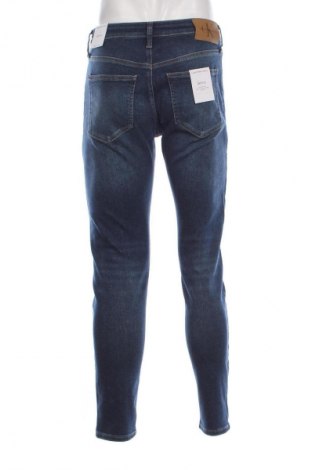 Męskie jeansy Calvin Klein, Rozmiar L, Kolor Niebieski, Cena 306,99 zł