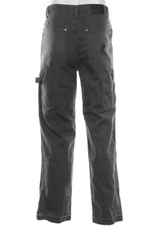 Férfi farmernadrág Karl Kani, Méret M, Szín Zöld, Ár 44 009 Ft