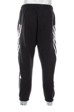 Męskie spodnie sportowe Adidas, Rozmiar L, Kolor Czarny, Cena 110,34 zł