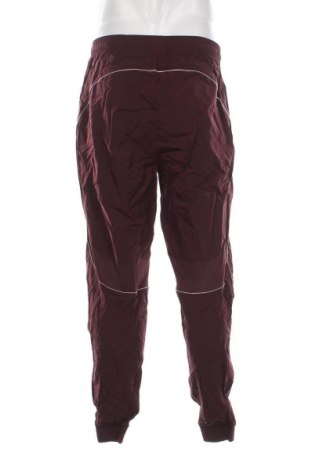 Męskie spodnie sportowe Nike, Rozmiar L, Kolor Czerwony, Cena 290,99 zł