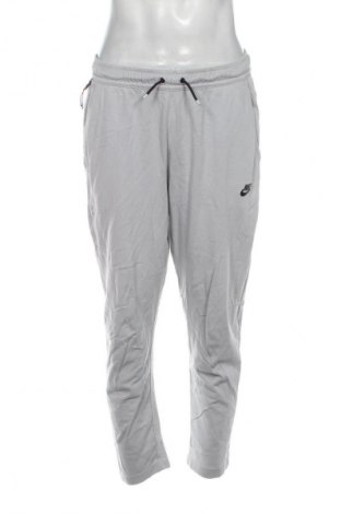 Мъжко спортно долнище Nike, Размер L, Цвят Сив, Цена 109,99 лв.