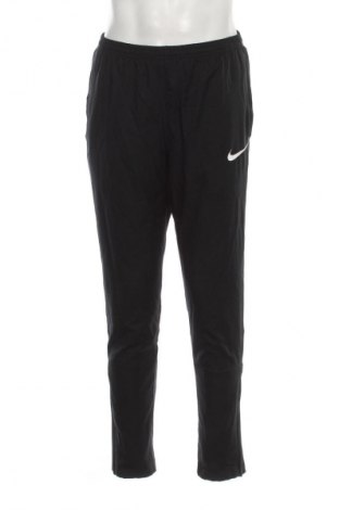 Męskie spodnie sportowe Nike, Rozmiar M, Kolor Czarny, Cena 45,98 zł