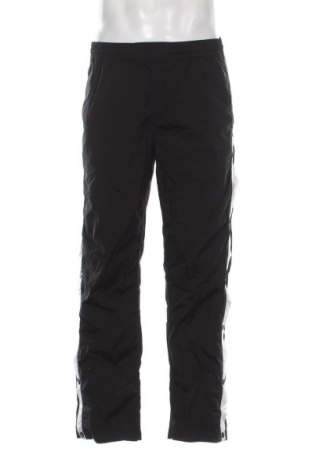 Мъжко спортно долнище Tommy Jeans, Размер L, Цвят Черен, Цена 157,99 лв.
