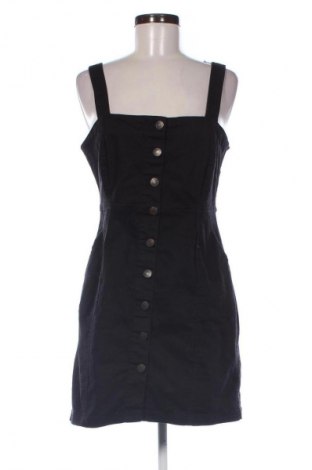 Latzkleid Janina, Größe M, Farbe Schwarz, Preis € 19,95