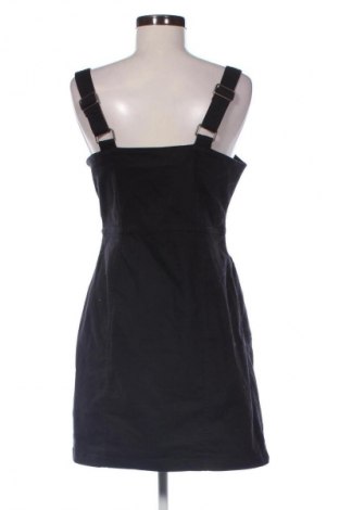 Latzkleid Janina, Größe M, Farbe Schwarz, Preis € 19,95