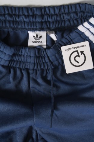 Damskie spodnie sportowe Adidas Originals, Rozmiar S, Kolor Niebieski, Cena 131,99 zł