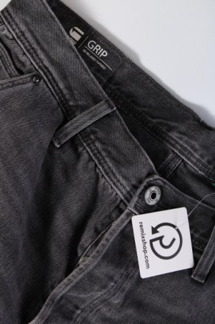 Męskie jeansy G-Star Raw, Rozmiar M, Kolor Szary, Cena 220,78 zł