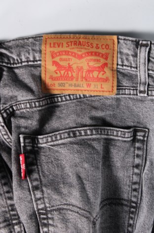 Męskie jeansy Levi's, Rozmiar M, Kolor Szary, Cena 341,56 zł