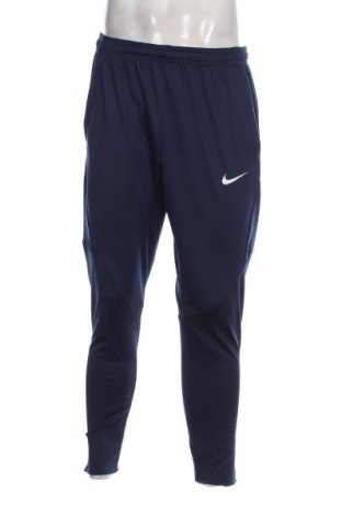 Pantaloni trening de bărbați Nike, Mărime XL, Culoare Albastru, Preț 157,99 Lei