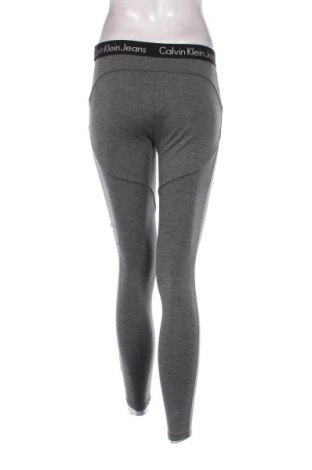 Damen Leggings Calvin Klein Jeans, Größe S, Farbe Grau, Preis 28,00 €