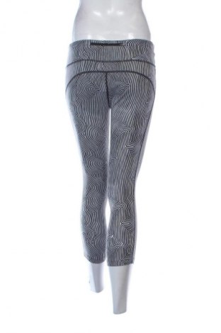 Damskie legginsy Nike, Rozmiar S, Kolor Kolorowy, Cena 101,99 zł