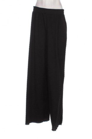 Damenhose Guido Maria Kretschmer for About You, Größe M, Farbe Schwarz, Preis 20,97 €