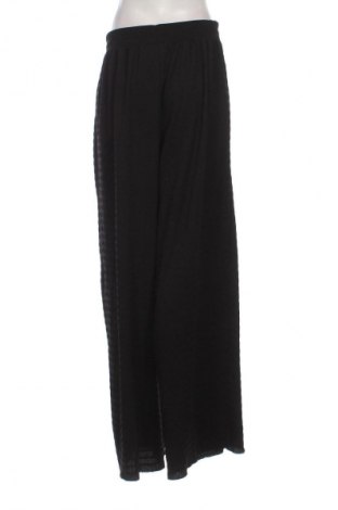 Damenhose Guido Maria Kretschmer for About You, Größe M, Farbe Schwarz, Preis 20,97 €