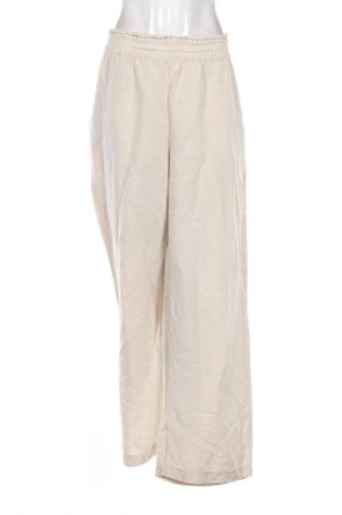 Damskie spodnie H&M, Rozmiar XL, Kolor Beżowy, Cena 66,67 zł