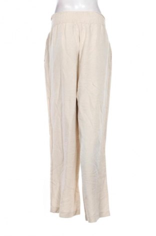 Damskie spodnie H&M, Rozmiar XL, Kolor Beżowy, Cena 66,67 zł