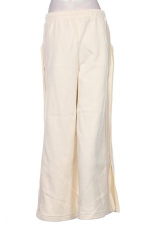 Dámské tepláky Adidas, Velikost M, Barva Oranžová, Cena  641,00 Kč