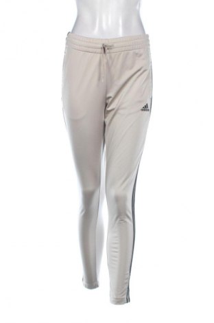Damskie spodnie sportowe Adidas, Rozmiar S, Kolor Beżowy, Cena 94,25 zł