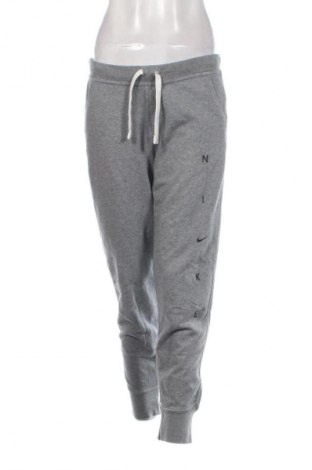 Γυναικείο αθλητικό παντελόνι Nike, Μέγεθος M, Χρώμα Γκρί, Τιμή 26,99 €