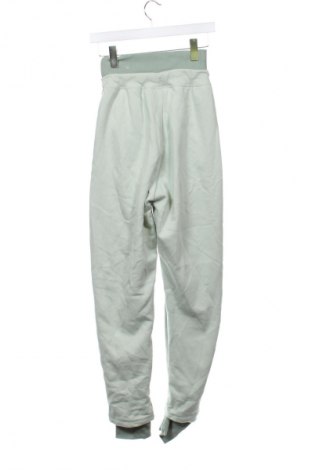 Γυναικείο αθλητικό παντελόνι Nike, Μέγεθος XS, Χρώμα Πράσινο, Τιμή 26,99 €