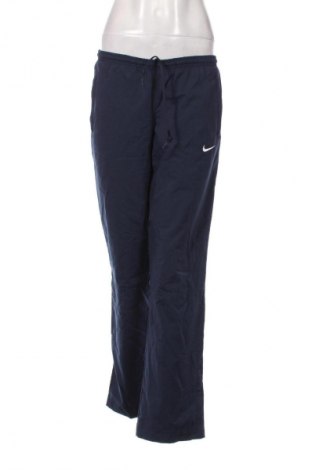 Pantaloni trening de femei Nike, Mărime M, Culoare Albastru, Preț 127,99 Lei