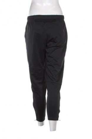 Γυναικείο αθλητικό παντελόνι Nike, Μέγεθος M, Χρώμα Μαύρο, Τιμή 27,99 €