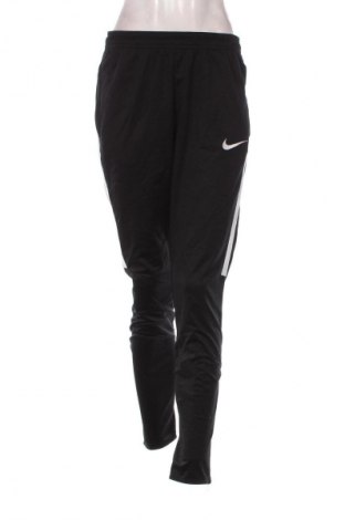 Damen Sporthose Nike, Größe L, Farbe Schwarz, Preis 27,99 €