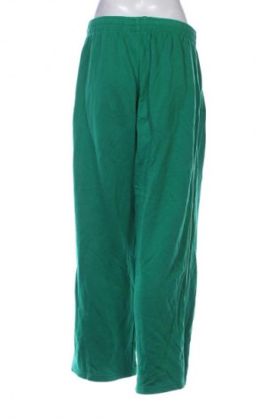 Dámské tepláky Nike, Velikost M, Barva Zelená, Cena  520,00 Kč