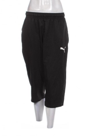 Damen Sporthose PUMA, Größe L, Farbe Schwarz, Preis 21,00 €