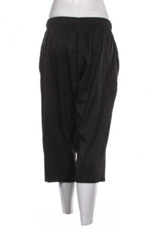 Damen Sporthose PUMA, Größe L, Farbe Schwarz, Preis 21,00 €