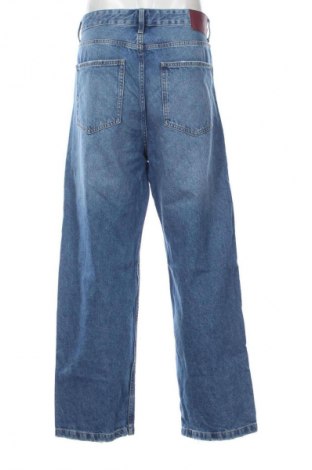 Męskie jeansy Bershka, Rozmiar L, Kolor Niebieski, Cena 91,95 zł