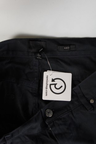 Męskie spodnie H&M, Rozmiar L, Kolor Niebieski, Cena 40,99 zł