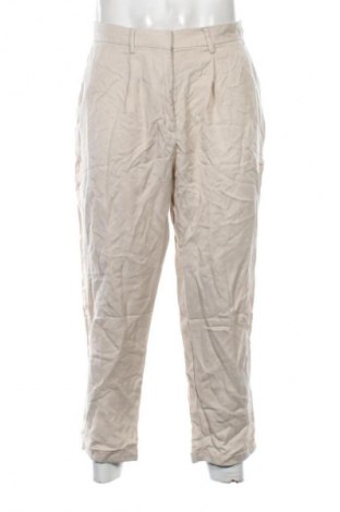 Męskie spodnie LC Waikiki, Rozmiar L, Kolor ecru, Cena 37,99 zł