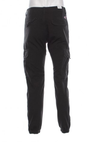 Pánske nohavice  Tommy Jeans, Veľkosť M, Farba Čierna, Cena  67,95 €