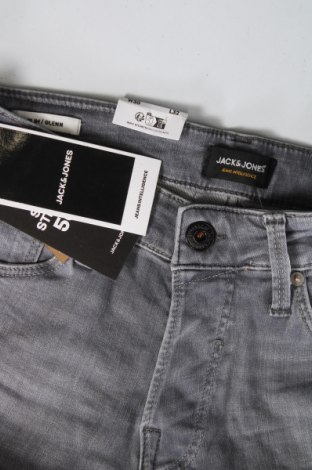 Herren Jeans Jack & Jones, Größe S, Farbe Grau, Preis 10,57 €