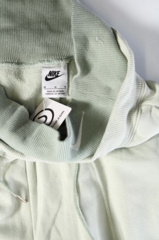 Γυναικείο αθλητικό παντελόνι Nike, Μέγεθος M, Χρώμα Πράσινο, Τιμή 25,99 €