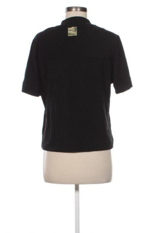 Γυναικεία μπλούζα Nikkie, Μέγεθος L, Χρώμα Μαύρο, Τιμή 14,99 €