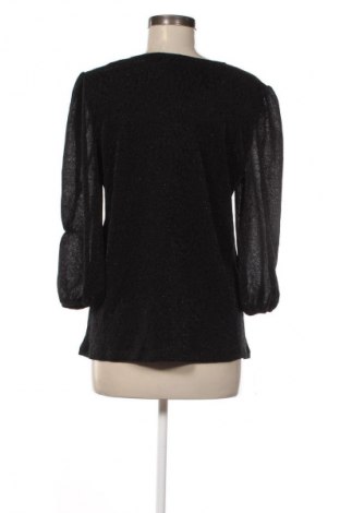 Γυναικεία μπλούζα SAINT, Μέγεθος L, Χρώμα Μαύρο, Τιμή 38,99 €
