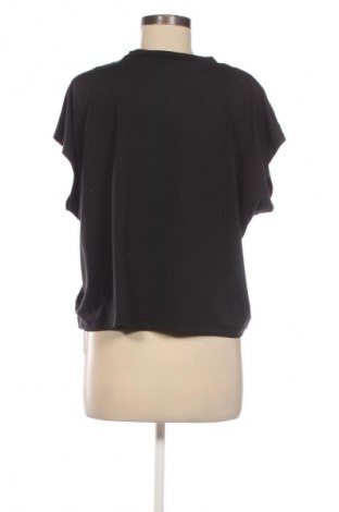 Γυναικείο t-shirt Crivit, Μέγεθος XL, Χρώμα Μαύρο, Τιμή 11,76 €