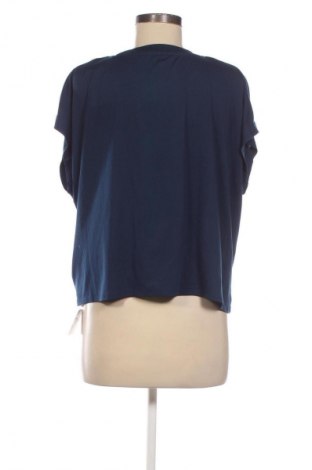 Γυναικείο t-shirt Crivit, Μέγεθος XL, Χρώμα Μπλέ, Τιμή 11,76 €