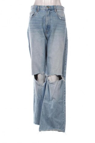 Damskie jeansy Zara, Rozmiar L, Kolor Niebieski, Cena 62,00 zł