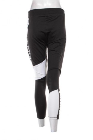 Γυναικείο κολάν PUMA, Μέγεθος L, Χρώμα Μαύρο, Τιμή 18,99 €