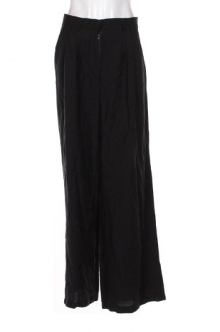 Dámske nohavice Guido Maria Kretschmer for About You, Veľkosť XL, Farba Čierna, Cena  56,95 €