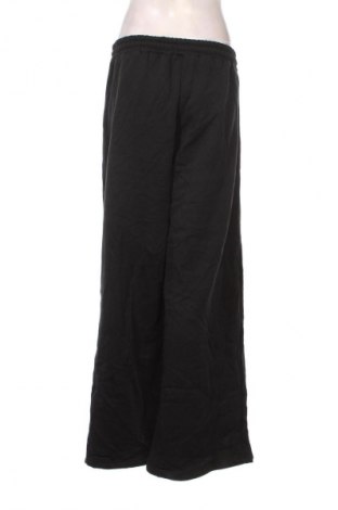 Γυναικείο αθλητικό παντελόνι NEW COLLECTION, Μέγεθος L, Χρώμα Πολύχρωμο, Τιμή 12,99 €