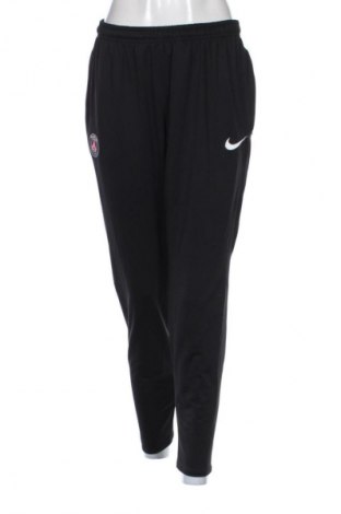 Γυναικείο αθλητικό παντελόνι Nike, Μέγεθος XL, Χρώμα Πολύχρωμο, Τιμή 25,99 €